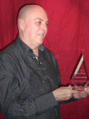 Stevie Hawkins receiving his Best jazz Artist award.
